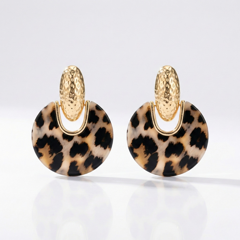 Pair of textured hoop earrings with exaggerated asymmetrical geometric posts for a sophisticated look.