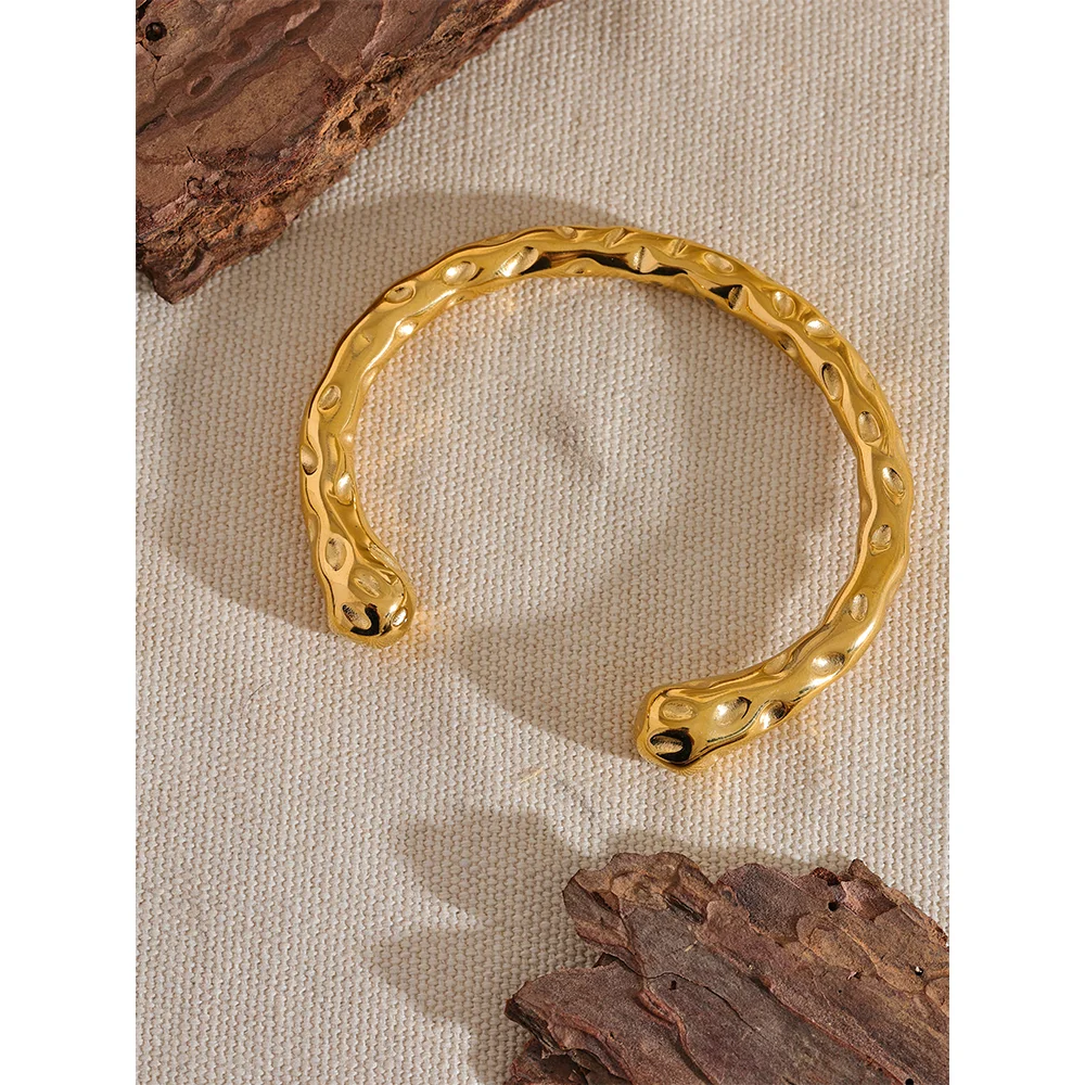 Radiant Resilience: Gold-Plated Hammered Stainless Steel Bracelet